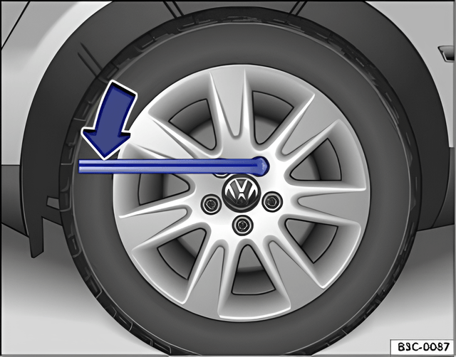 Fig. 168 Changing a wheel: loosening the wheel bolts