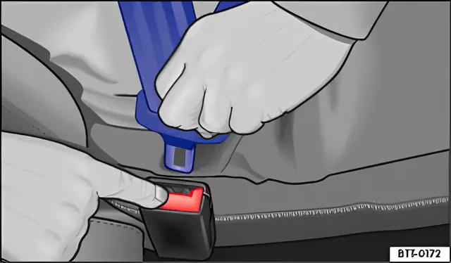 Fig. 51 Releasing the latch plate from the belt buckle
